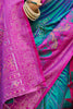Teal Green and Magenta Banarasi Silk Saree with Rich Zari Woven Border