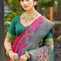 Rani Pink and Green Banarasi Silk Saree with Rich Zari Woven Border