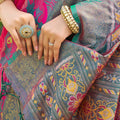 Rani Pink and Green Banarasi Silk Saree with Rich Zari Woven Border