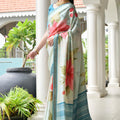 Mint Green Floral Printed Silk Blend Saree with Blue Woven Border
