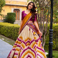 Trendy Multicolor Tussar Silk Lehenga Choli with Printed Flared Skirt and Contrast Dupatta