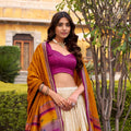 Trendy Multicolor Tussar Silk Lehenga Choli with Printed Flared Skirt and Contrast Dupatta