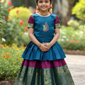 Beautiful Green and Purple Jacquard Girls Lehenga Choli with Gold Border for Wedding