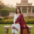 Charming Off White Faux Georgette Embroidered Readymade Palazzo Suit with Maroon Dupatta
