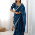 Teal Blue Designer Saree with Elegant Silver Embroidered Border