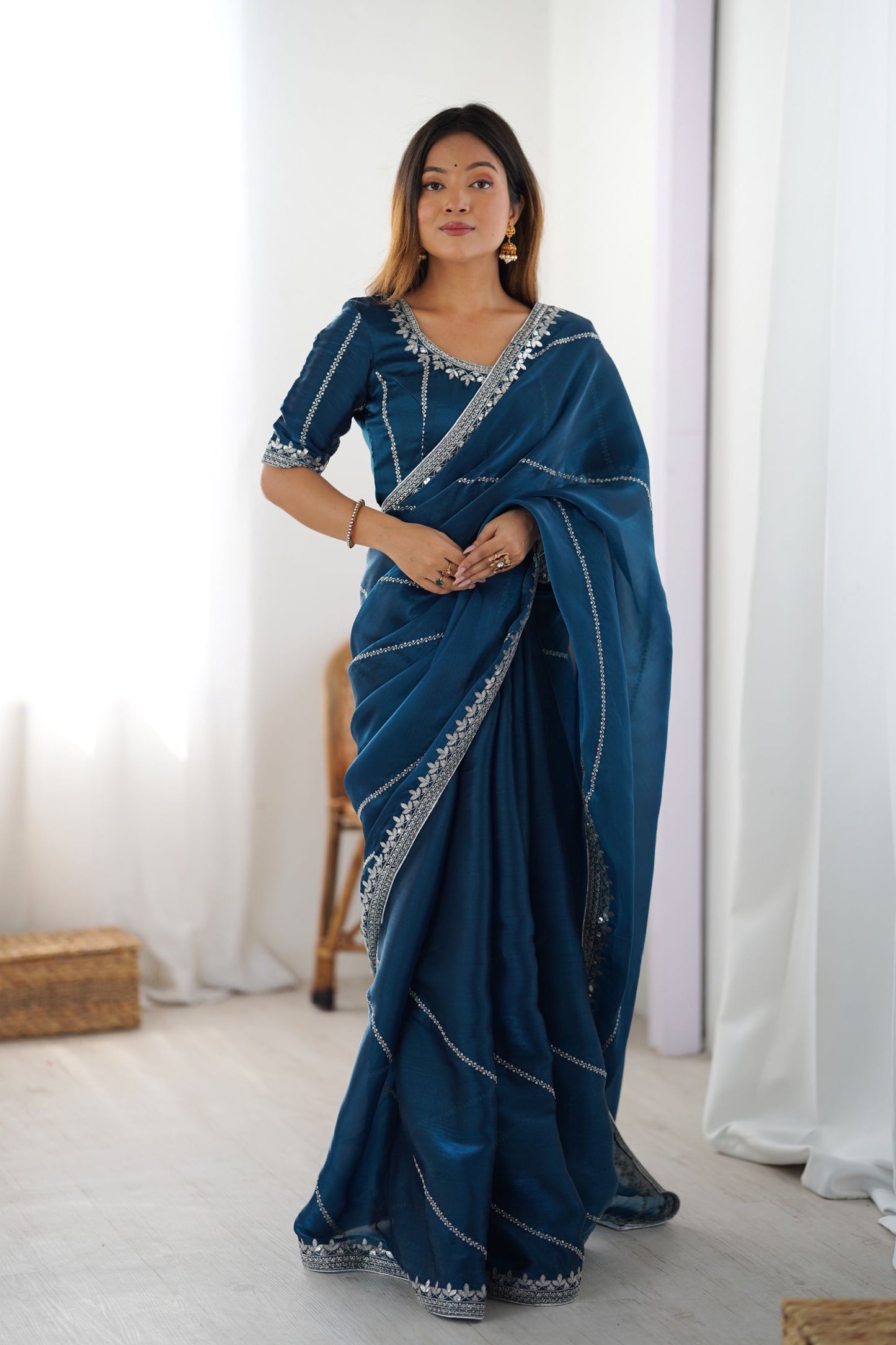 Teal Blue Designer Saree with Elegant Silver Embroidered Border