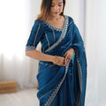 Teal Blue Designer Saree with Elegant Silver Embroidered Border