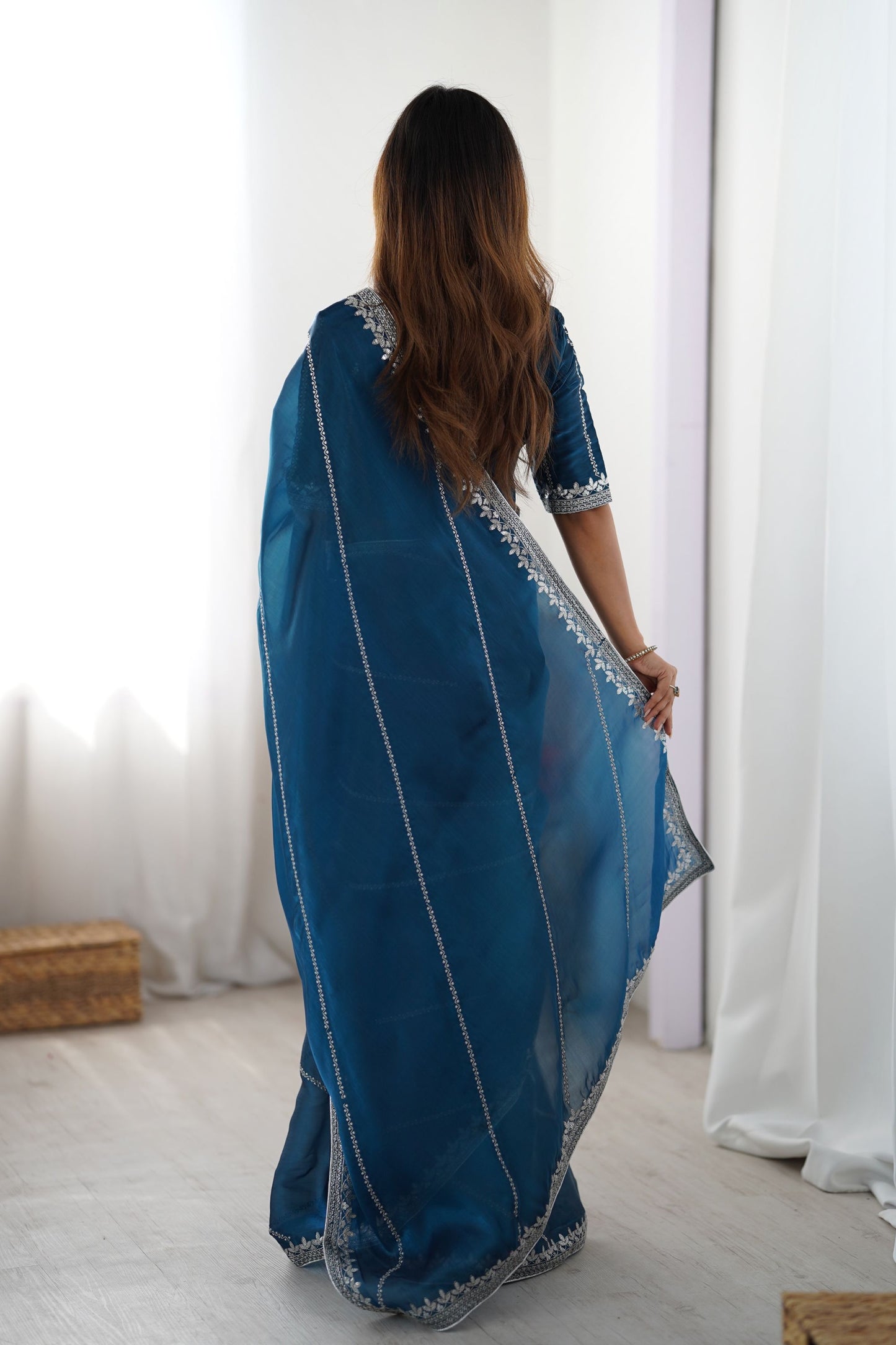 Teal Blue Designer Saree with Elegant Silver Embroidered Border