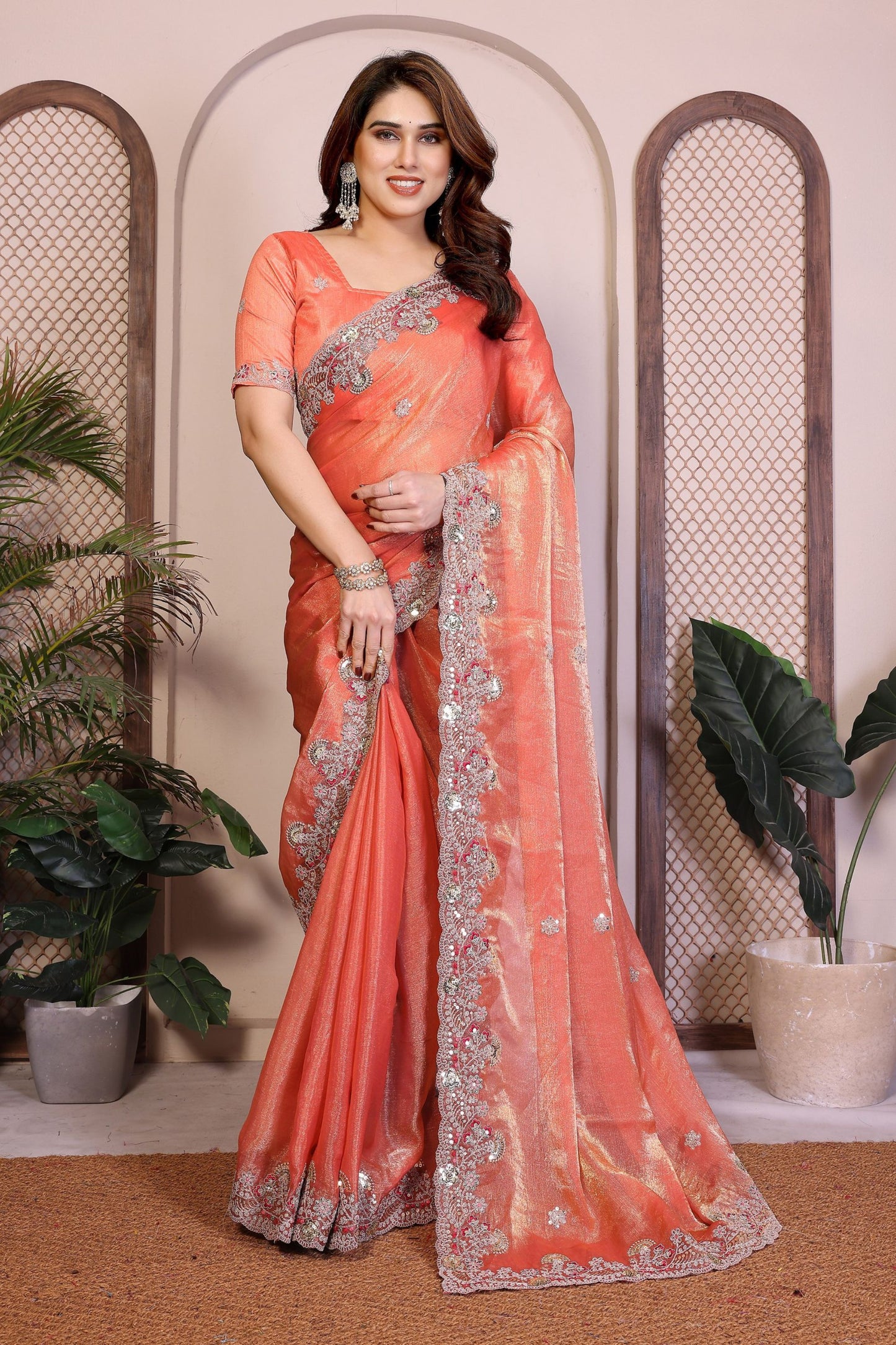 Peach Orange Silk Saree with Rich Embroidered Border