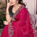 Pink Silk Saree with Intricate Embroidered Border Green Blouse
