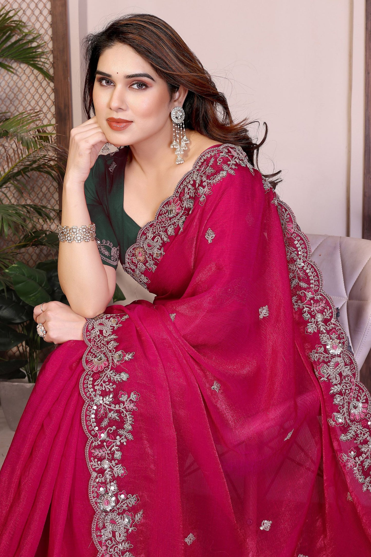 Pink Silk Saree with Intricate Embroidered Border Green Blouse