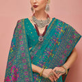 Teal Patola Printed Silk Saree with Traditional Border Festive Wear