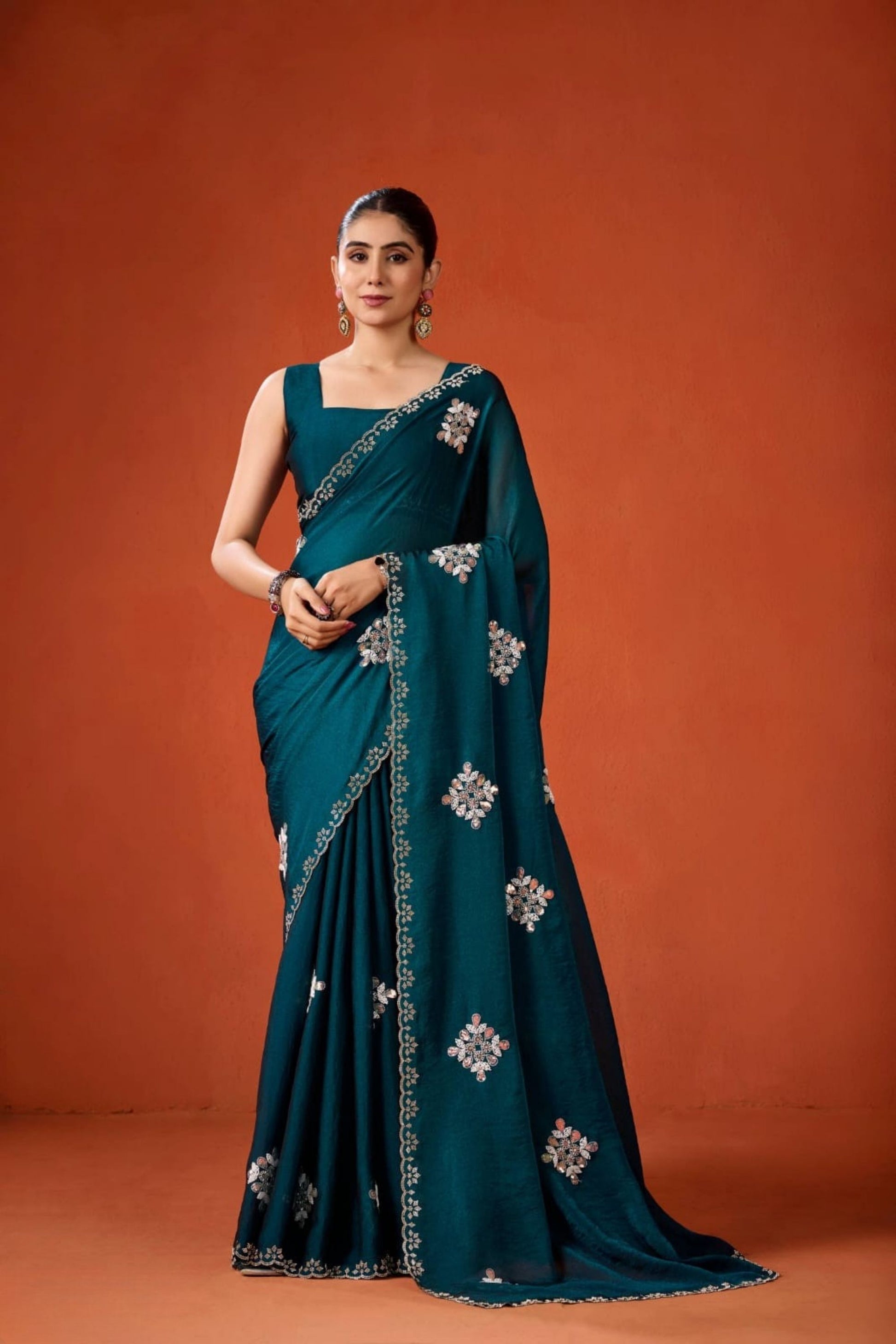 Dark Teal Embroidered Georgette Saree Floral Motifs Designer Border