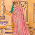 Pastel Pink Banarasi Silk Saree with Golden Zari Contrast Teal Blouse