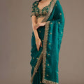 Green Silk Saree with Heavy Zari Embroidered Border Designer Blouse