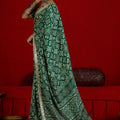 Green Bandhani Print Georgette Saree with Golden Border Festive Wear
