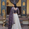 Stylish Purple Cosmos Silk Embroidered Lehenga Choli with Ivory Flared Skirt