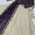 Stylish Purple Cosmos Silk Embroidered Lehenga Choli with Ivory Flared Skirt