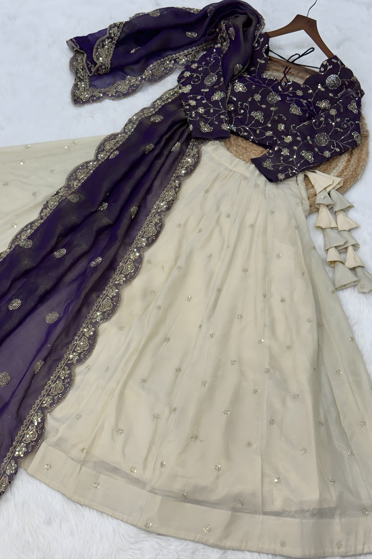 Stylish Purple Cosmos Silk Embroidered Lehenga Choli with Ivory Flared Skirt
