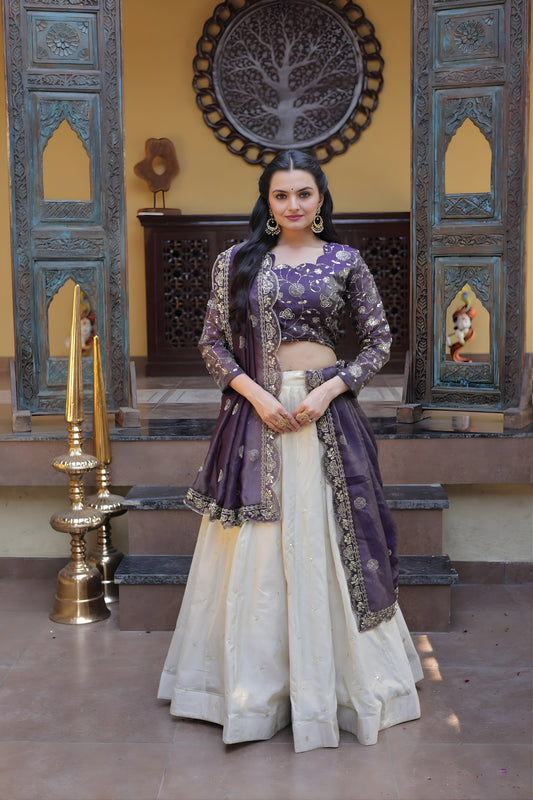 Stylish Purple Cosmos Silk Embroidered Lehenga Choli with Ivory Flared Skirt