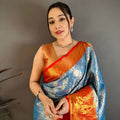 Sky Blue Kanchipuram Silk Saree With Rich Orange Zari Border Pallu
