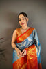 Sky Blue Kanchipuram Silk Saree With Rich Orange Zari Border Pallu