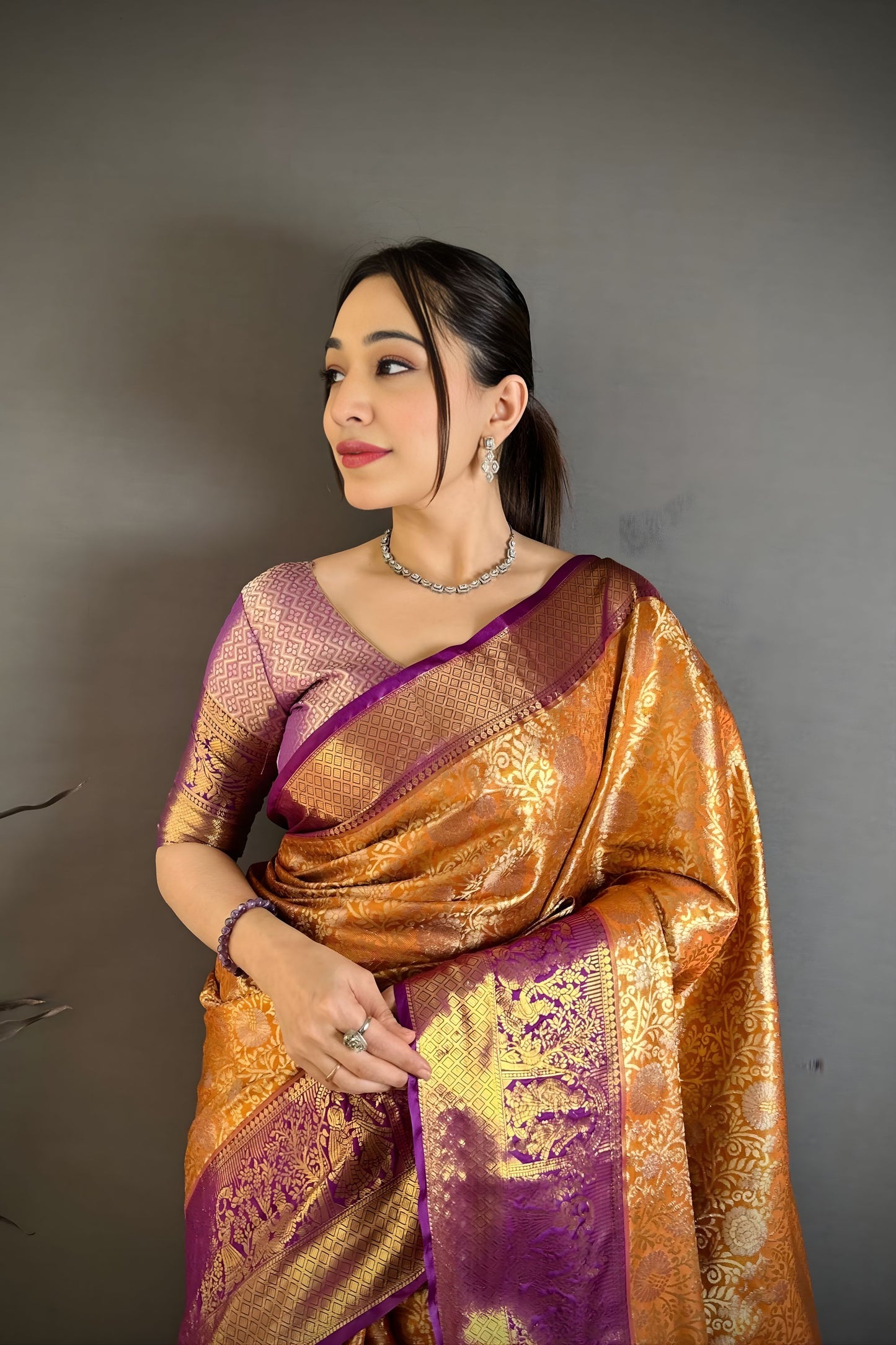 Royal Orange Kanchipuram Silk Saree with Rich Purple Zari Border Woven Pallu