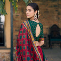 Elegant Red Tasar Silk Lehenga Choli with Green Blouse and Dupatta for Navratri