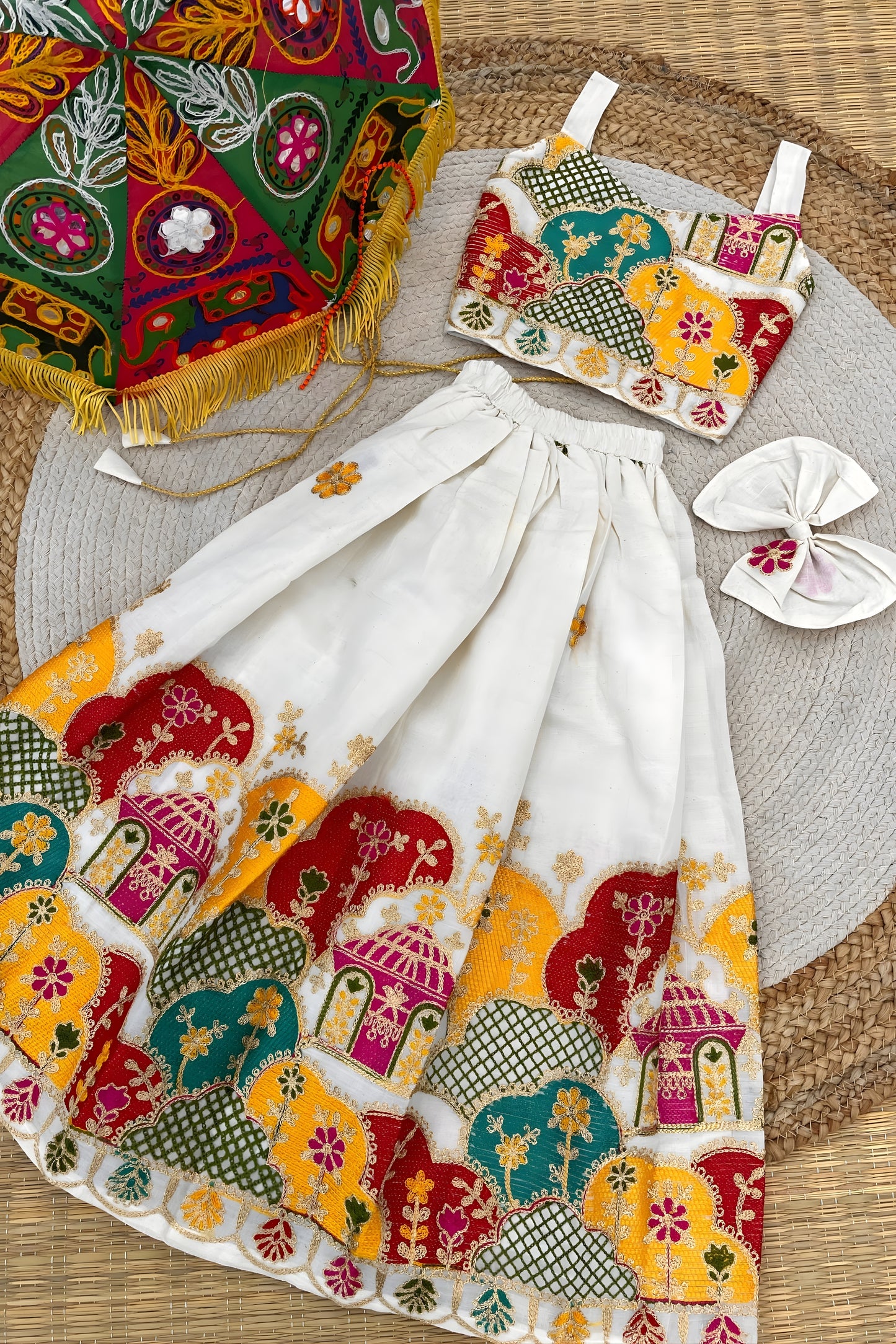 Beautiful Off White Khadi Cotton Girls Lehenga Choli with Multicolor Temple Motif for Festival