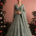 Stylish Dark Grey Butterfly Net Heavy Embroidered Lehenga Choli with Designer Dupatta for Wedding