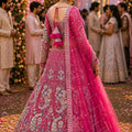 Stylish Rani Pink Net Lehenga Choli with Heavy Embroidery Work and Designer Dupatta for Wedding