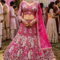 Stylish Rani Pink Net Lehenga Choli with Heavy Embroidery Work and Designer Dupatta for Wedding