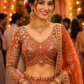 Awesome Orange Net Lehenga Choli with Heavy Embroidery Work and Designer Dupatta for Wedding