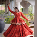 Impressive Rust Orange Cotton Designer Lehenga Choli with Layered Flared Skirt for Navratri
