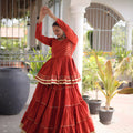 Impressive Rust Orange Cotton Designer Lehenga Choli with Layered Flared Skirt for Navratri