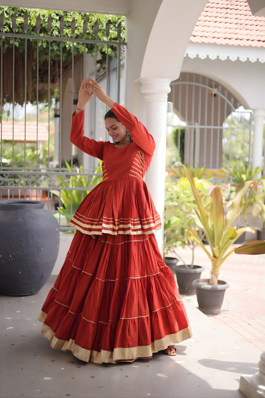 Impressive Rust Orange Cotton Designer Lehenga Choli with Layered Flared Skirt for Navratri