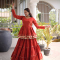Impressive Rust Orange Cotton Designer Lehenga Choli with Layered Flared Skirt for Navratri