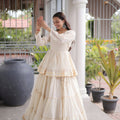 Charming Off White Cotton Designer Lehenga Choli with Layered Flared Skirt for Navratri
