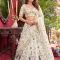 Luxury Off White Net Embroidered Lehenga Choli with Peacock Floral Thread Work and Matching Dupatta
