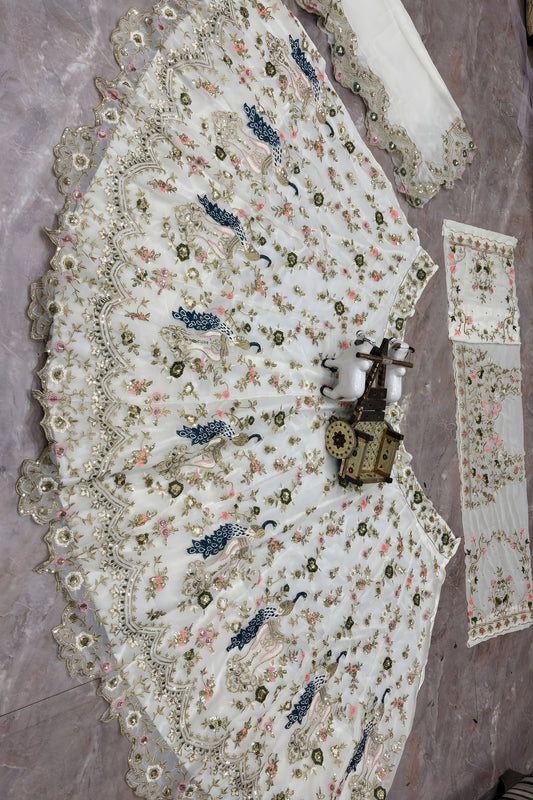 Luxury Off White Net Embroidered Lehenga Choli with Peacock Floral Thread Work and Matching Dupatta