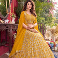 Luxury Mustard Yellow Faux Georgette Lehenga Choli with Heavy Embroidery Work and Matching Dupatta