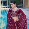 Impressive Wine Maroon Rangoli Crush Silk Designer Lehenga Choli with Embroidery Work and Matching Dupatta