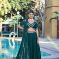 Elegant Rama Green Rangoli Crush Silk Designer Lehenga Choli with Embroidery Work and Matching Dupatta