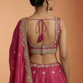 Stylish Rani Pink Designer Lehenga Choli with Heavy Embroidery Work and Matching Dupatta