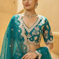 Exquisite Teal Green Designer Lehenga Choli with Heavy Embroidery Work and Matching Dupatta
