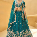 Exquisite Teal Green Designer Lehenga Choli with Heavy Embroidery Work and Matching Dupatta