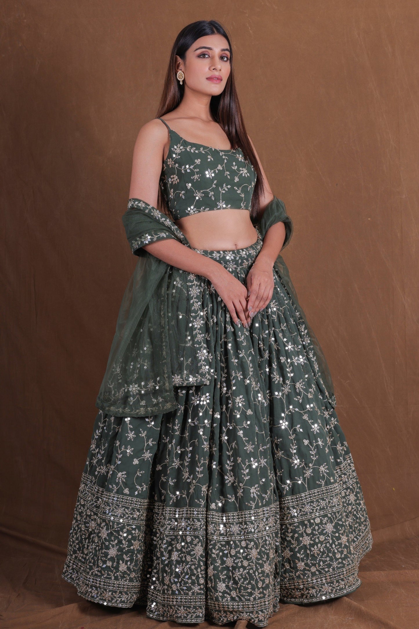 Stylish Rama Green Georgette Designer Lehenga Choli with Embroidery Work and Soft Net Dupatta