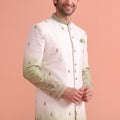 Stunning White and Green Embroidered Designer Indo Western Suit for Men with Elephant Motif Work