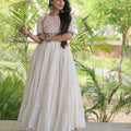 Wonderful White Cotton Mirror Work Designer Gown for Women with Flared Tiered Skirt