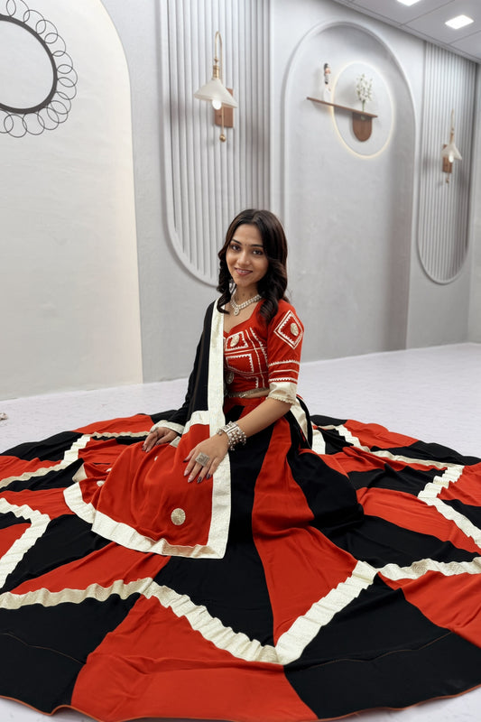Trendy Black and Orange Cotton Designer Lehenga Choli Set with Gotta Patti Lace Work